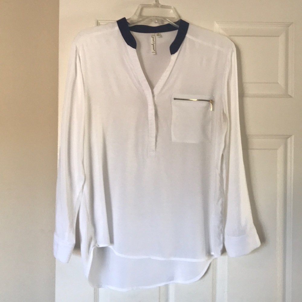 White rayon long sleeve blouse.